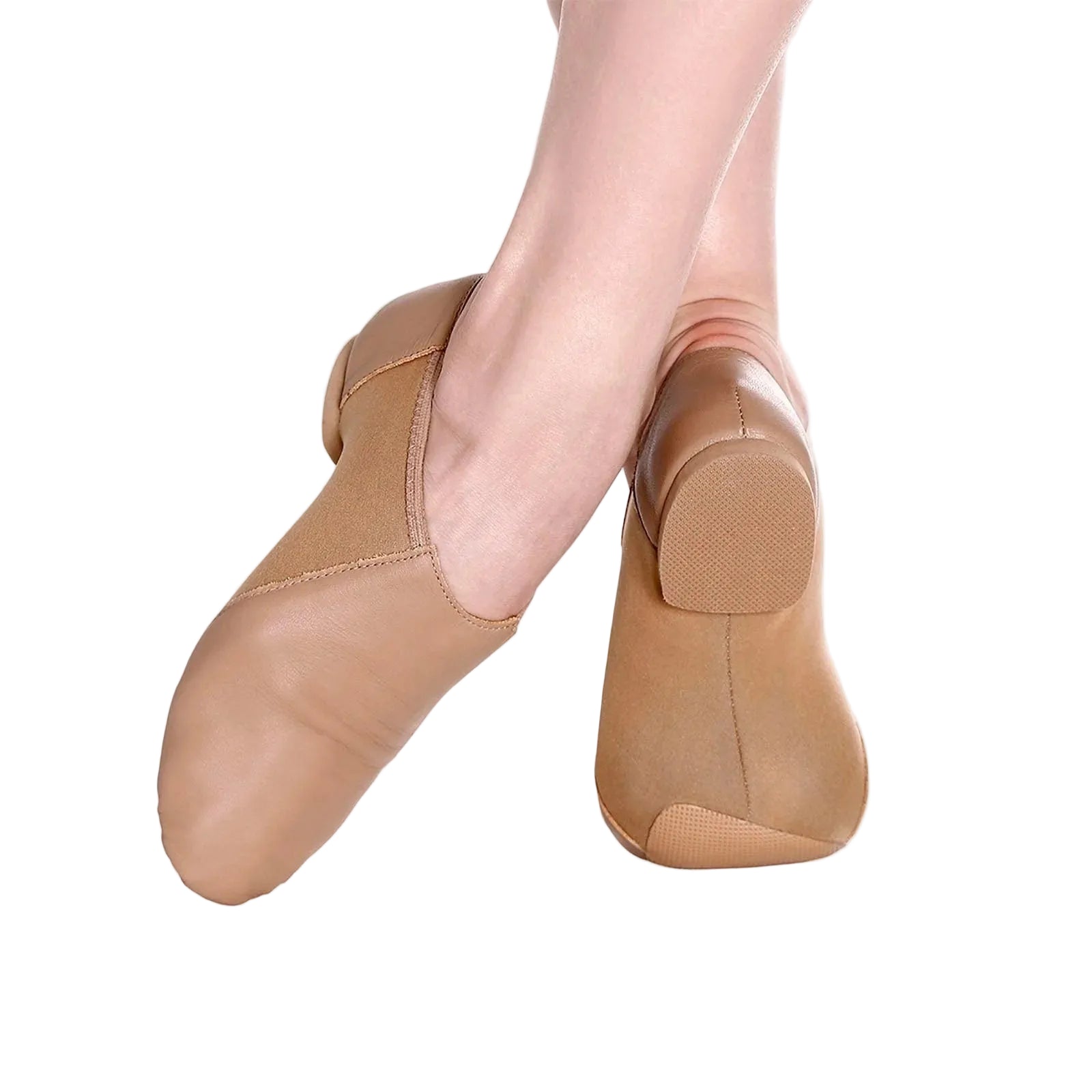 A pair of tan leather ballet slippers shown on a dancer's feet against a clean white background.